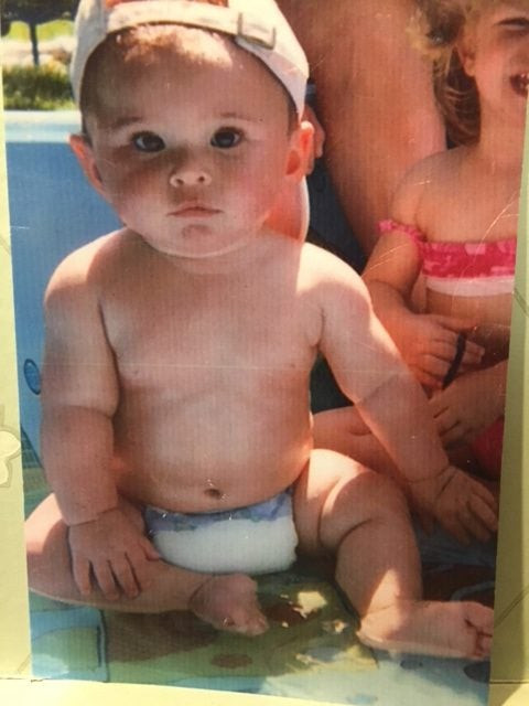 a young child in a pool