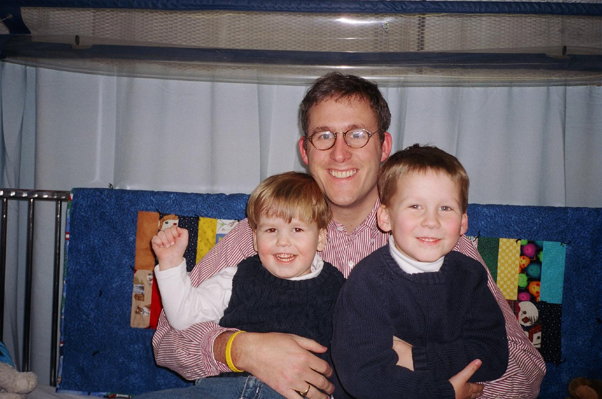 a father with two young boys