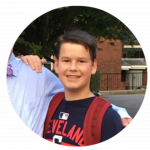 a young boy smiling